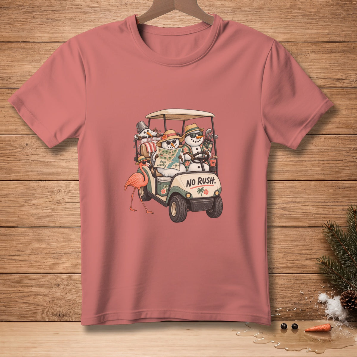 T-shirt graphic of snowmen in a golf cart with a flamingo and "NO RUSH." text.