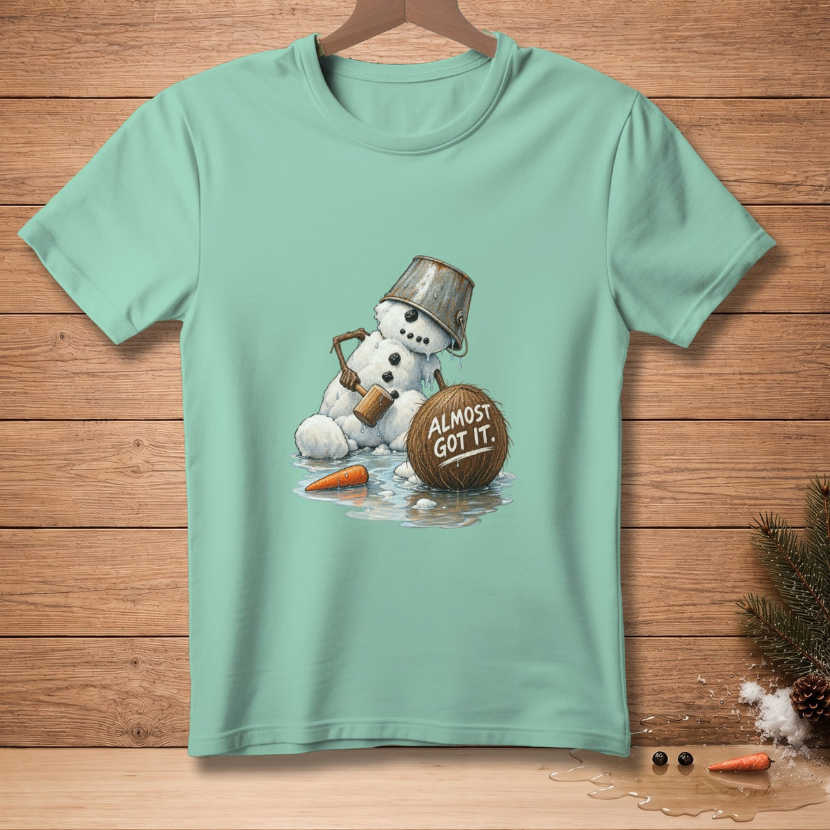Snowman with bucket hat and mallet near coconut with "ALMOST GOT IT." text.
