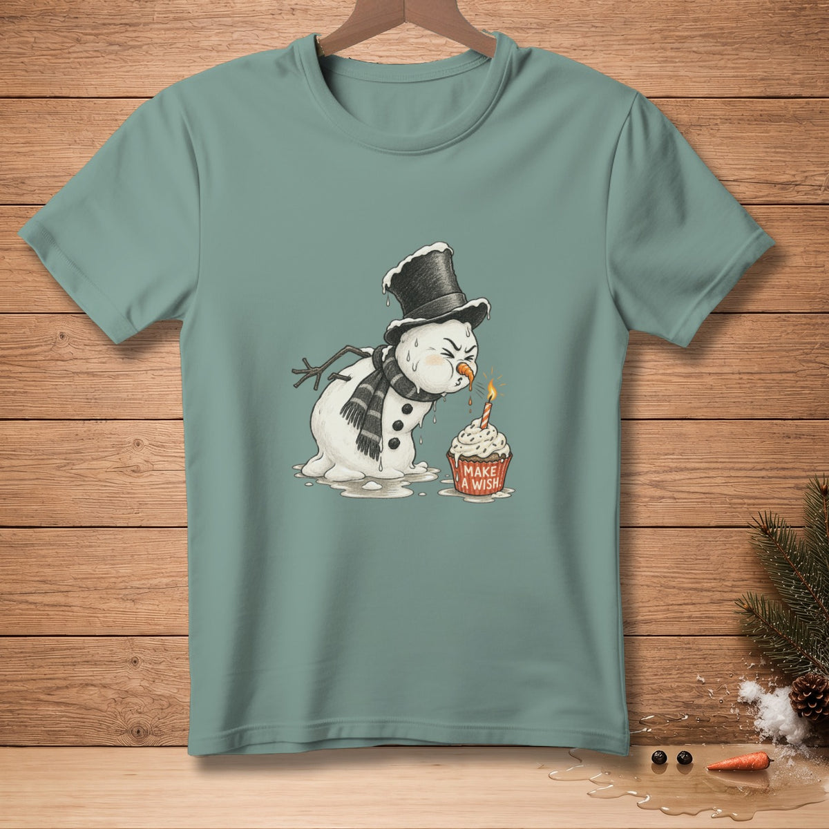 Melting snowman in top hat blowing out birthday candle on cupcake with "Make a Wish" text.