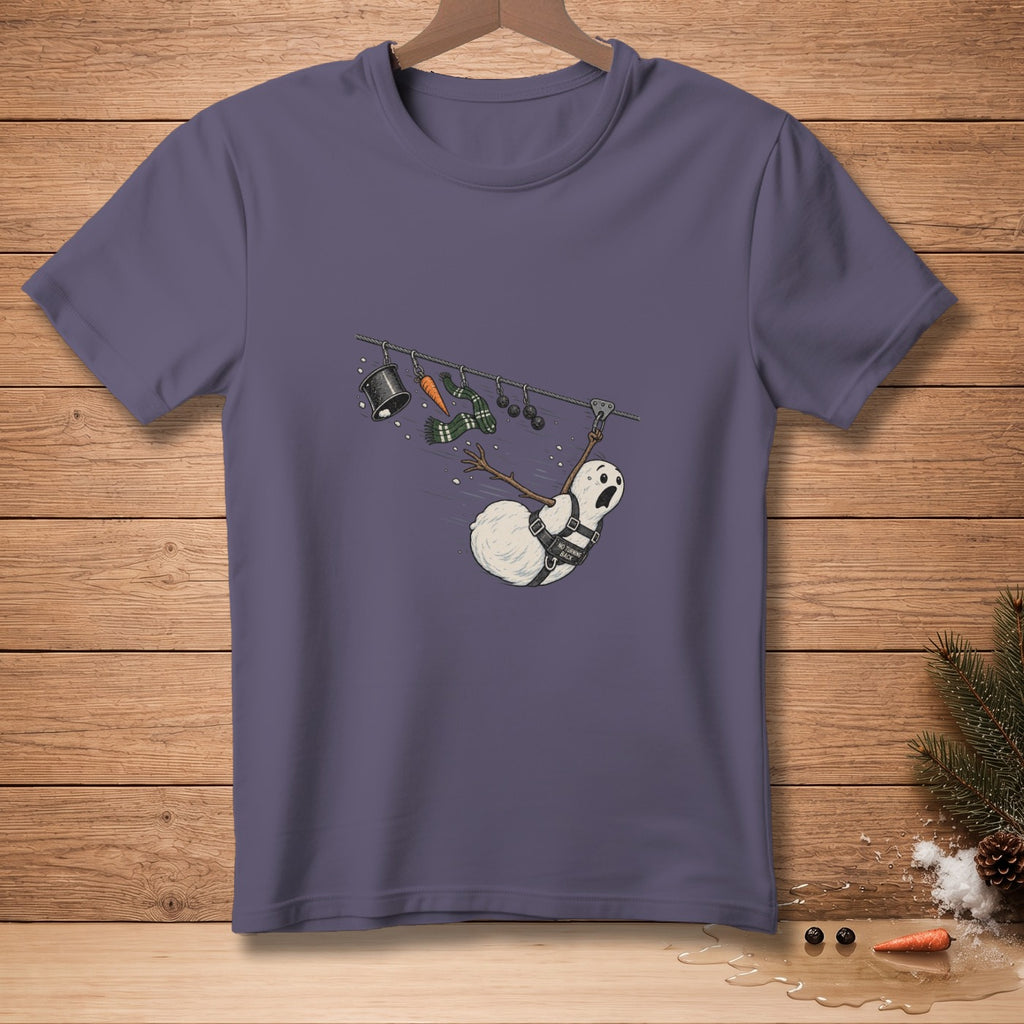 Snowman on zipline with startled expression, a carrot and scarf hanging nearby.
