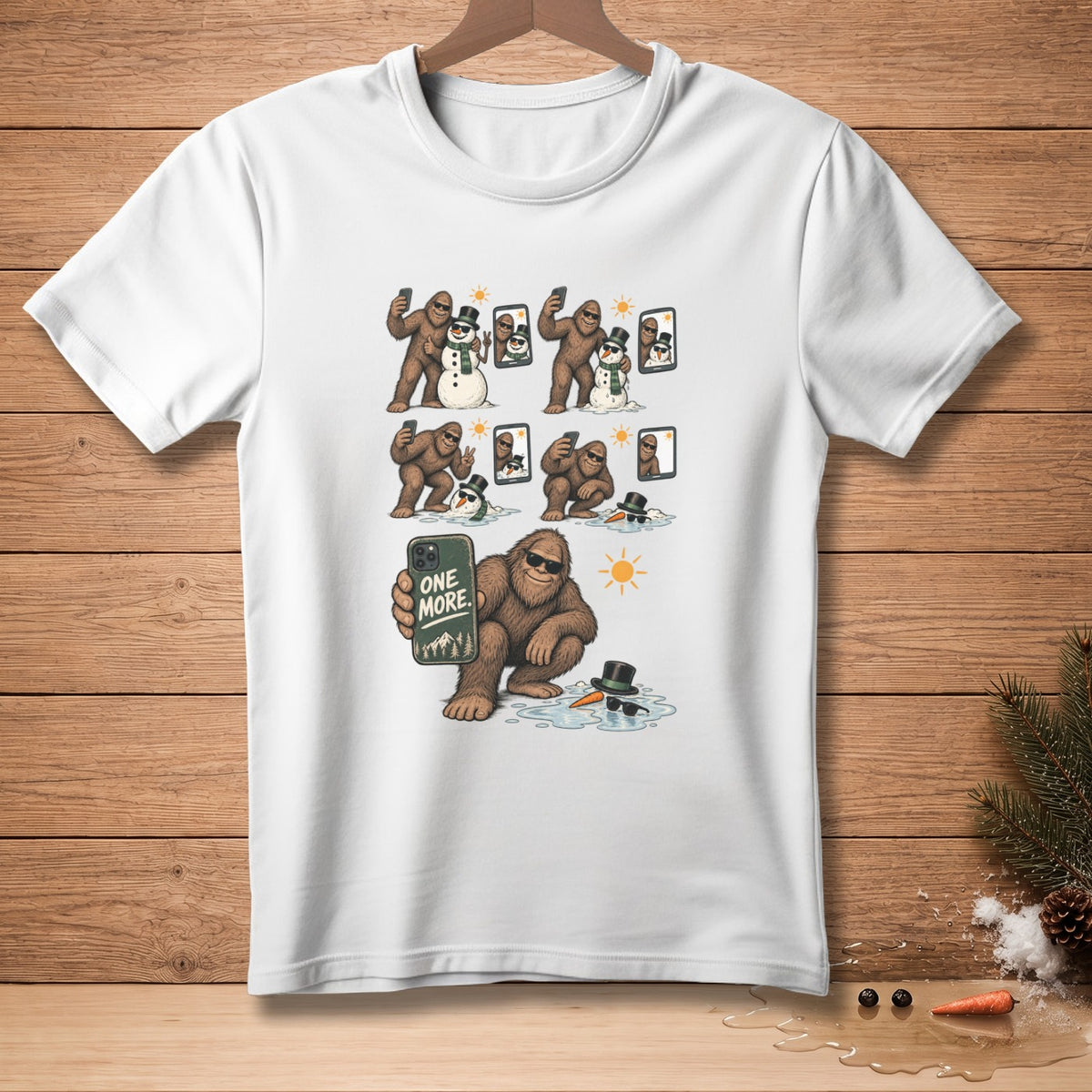Bigfoot takes selfies with snowmen; one holds a phone with "ONE MORE."