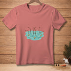 Pink t-shirt with cartoon snowmen sinking into water, with carrot noses.
