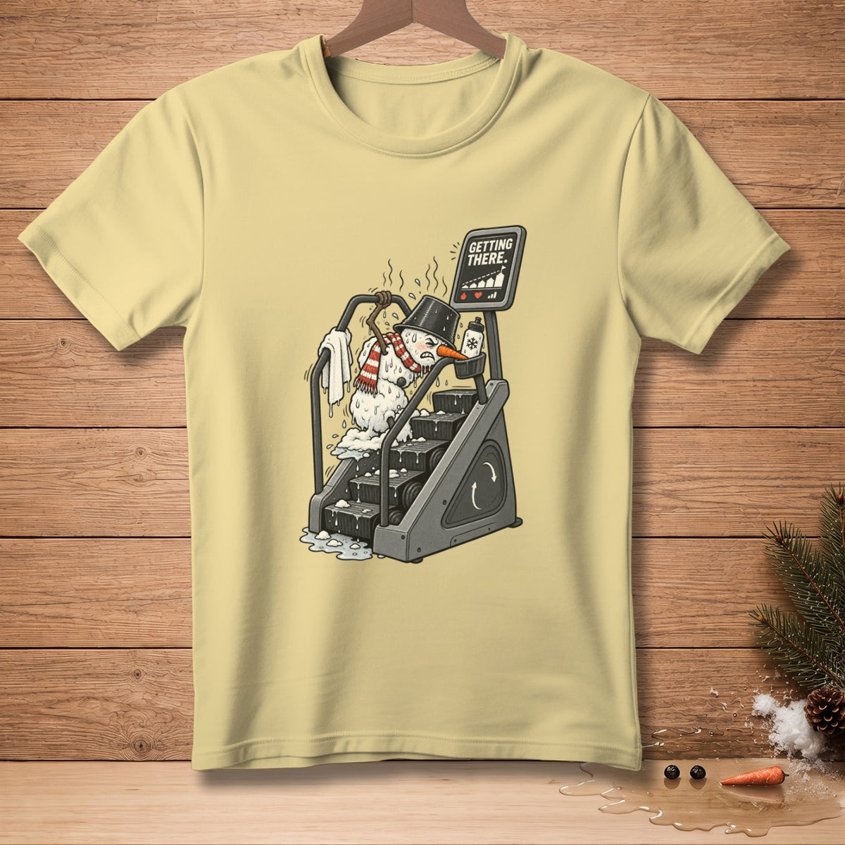 Snowman melting on a stair stepper with "GETTING THERE." text.