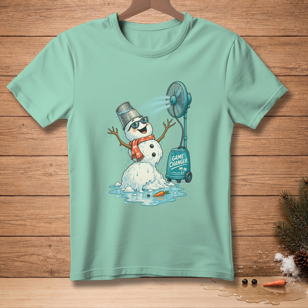 Melting snowman with sunglasses and scarf cools off with a fan that says "Game Changer".
