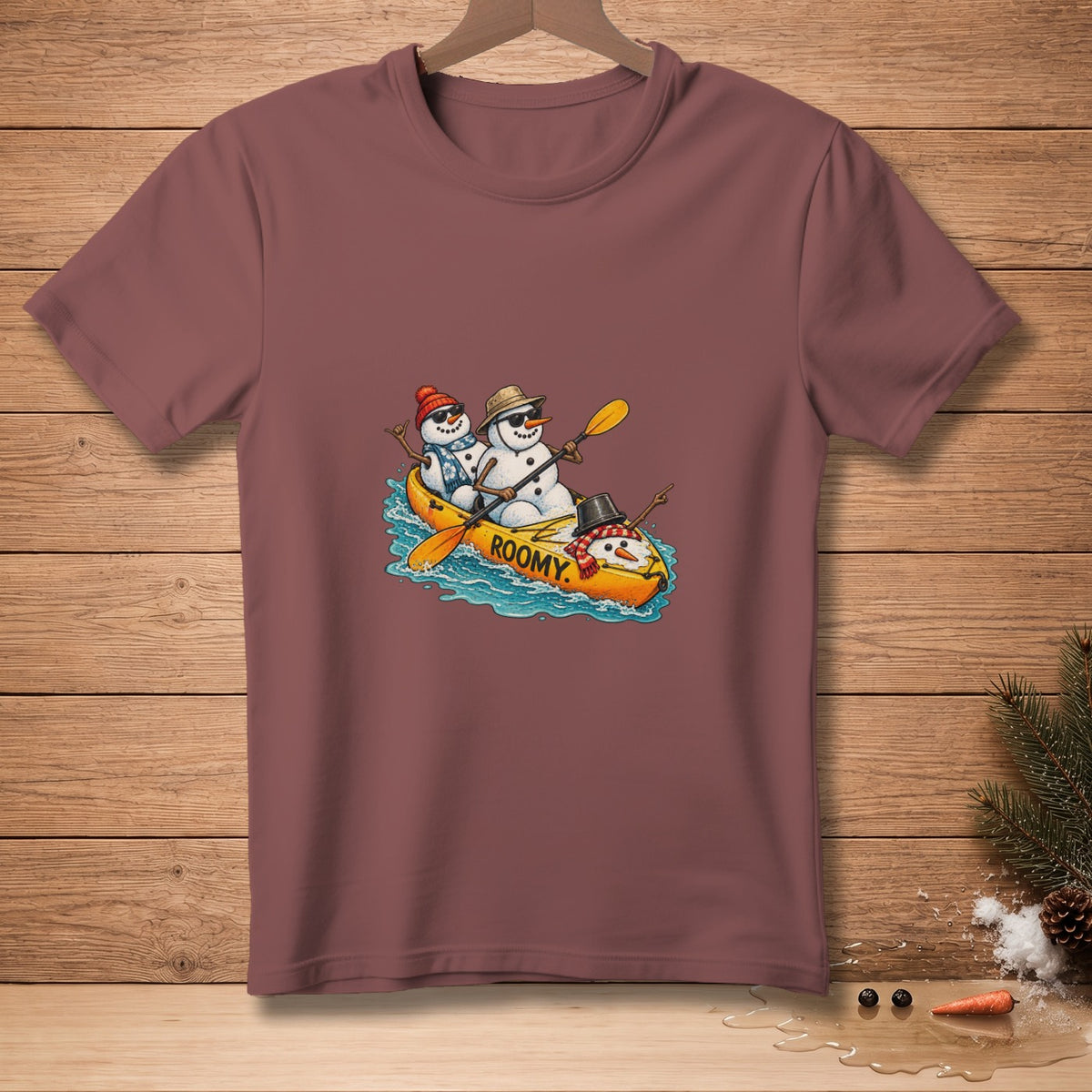 Three snowmen in a kayak with paddles and "ROOMY" text.