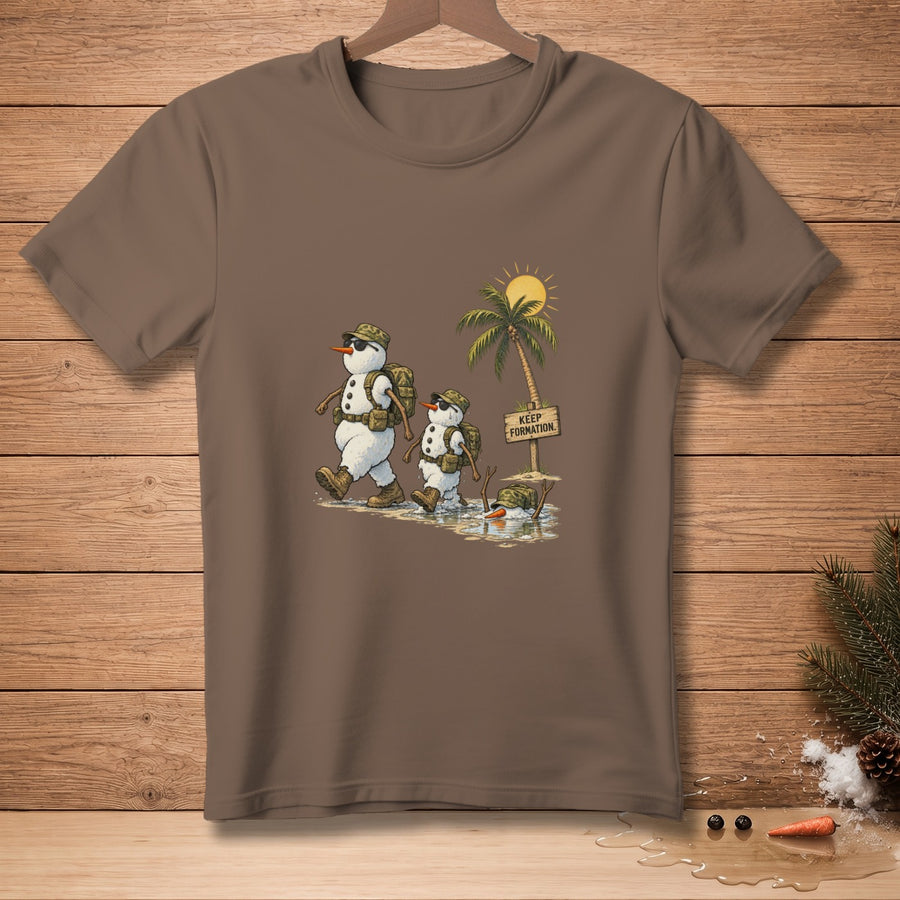 Two snowmen in camouflage gear hike past a palm tree with a "KEEP FORMATION" sign.