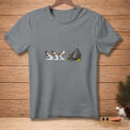 Gray t-shirt with cartoon of snowmen pulling rope tied to gorilla eating banana.