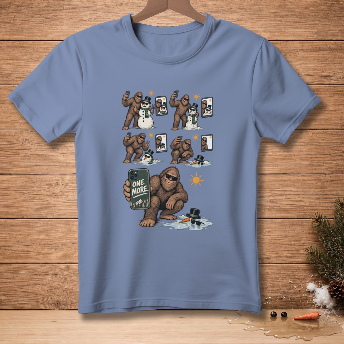 Bigfoot takes selfies with snowmen, one reads "ONE MORE".