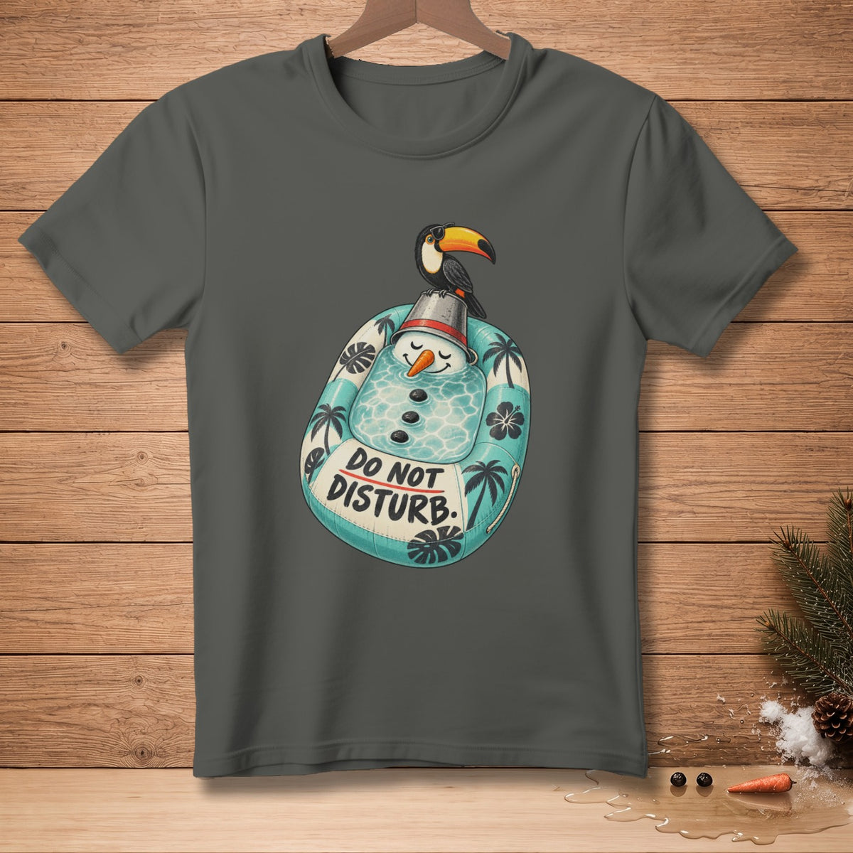 Gray t-shirt featuring a snowman in a beach float, with a toucan on its head.