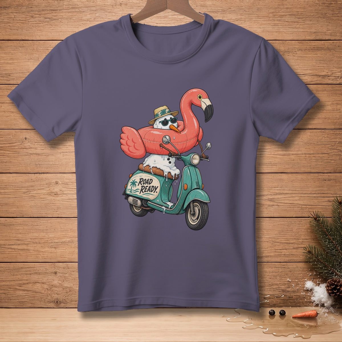 Snowman wearing flamingo float, sunglasses, and hat riding a scooter with "Road Ready" text.