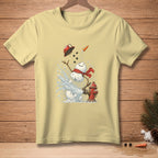 Light yellow t-shirt with snowman spraying water from fire hydrant graphic.