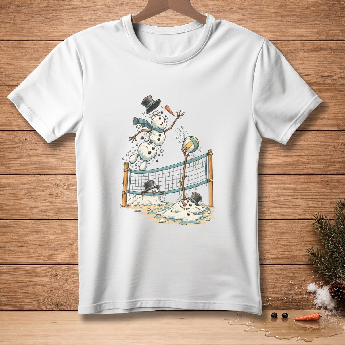 White t-shirt with graphic of snowmen playing volleyball.