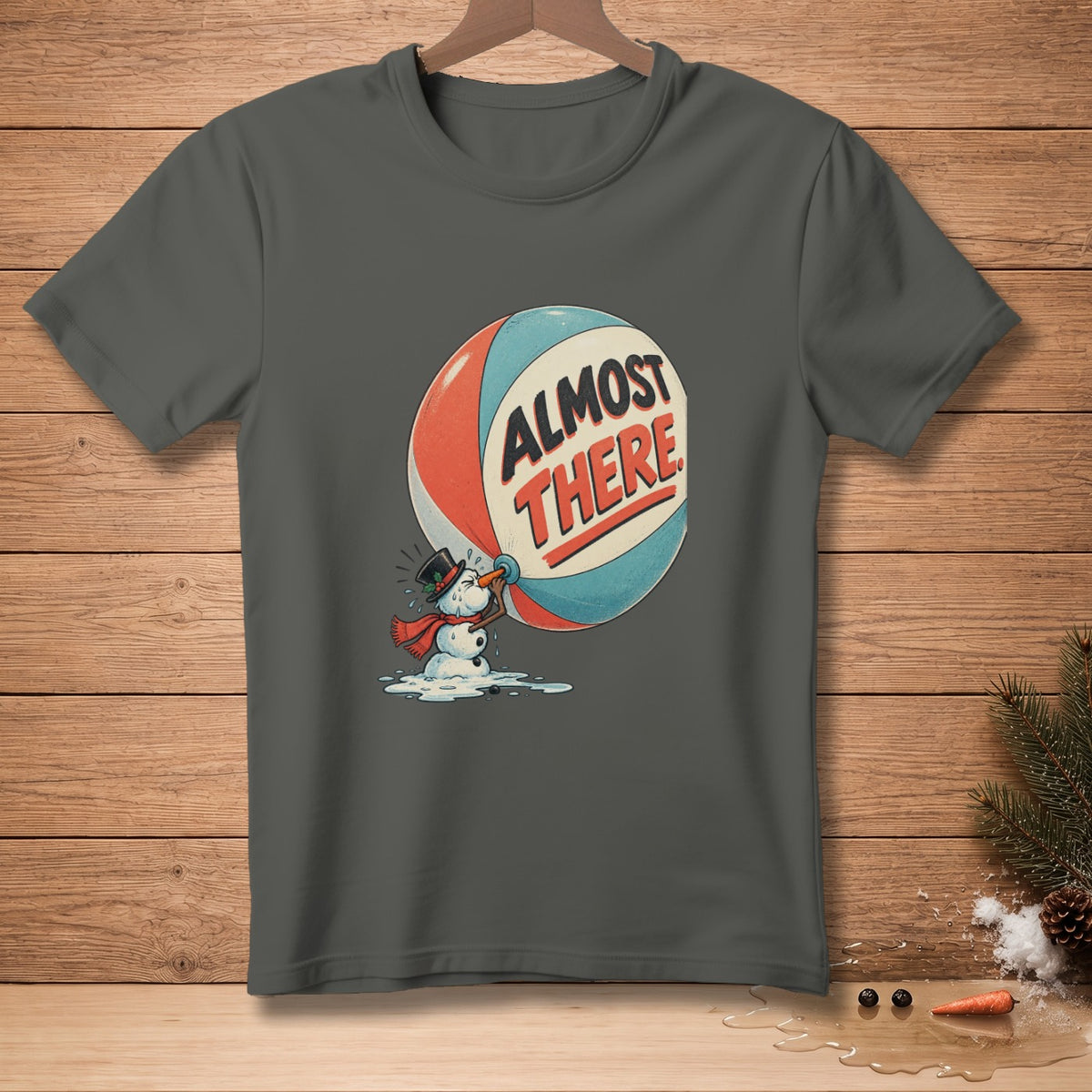 Snowman drinking from a ball with "Almost There" text.