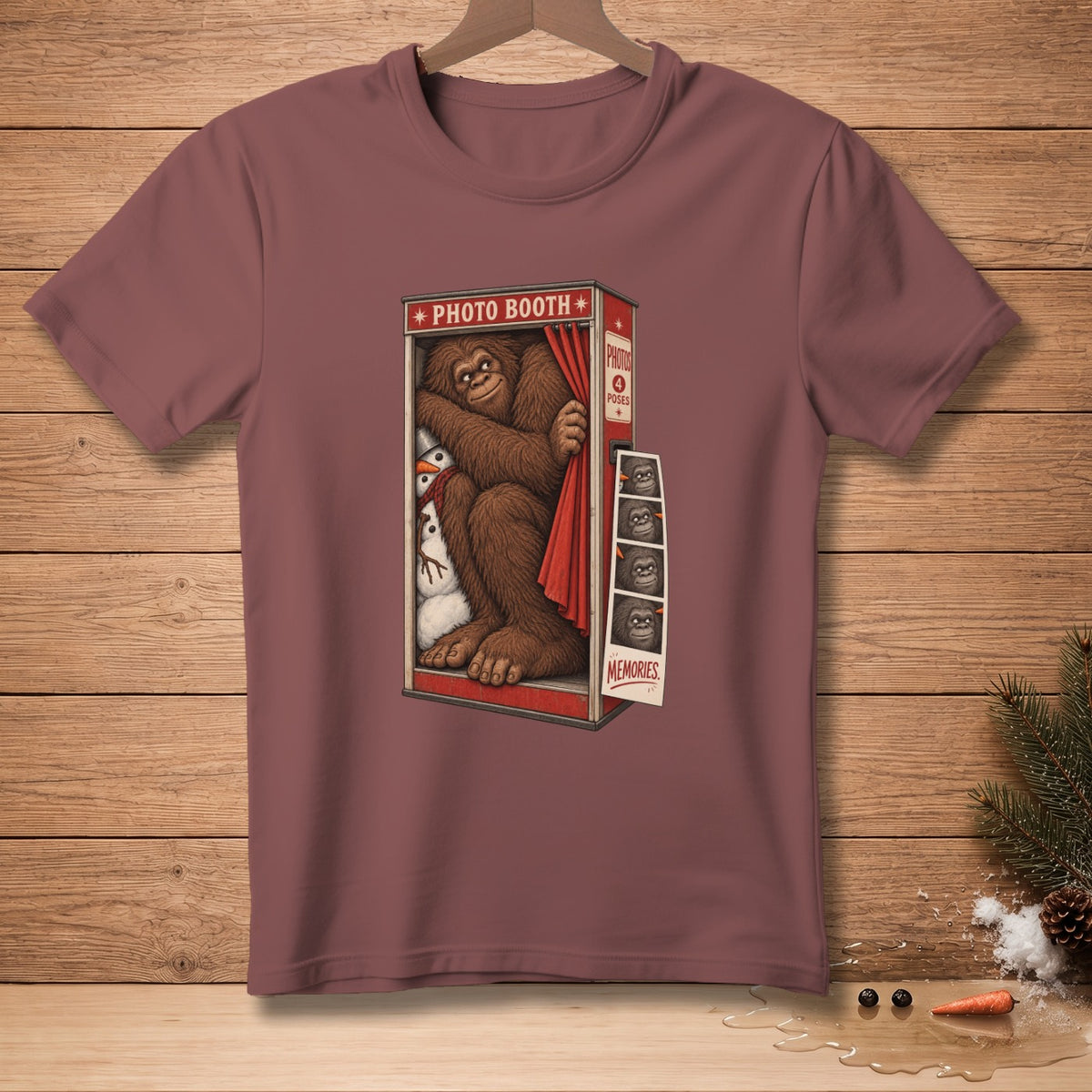 Bigfoot in a photo booth with snowmen and printed photos of Bigfoot.