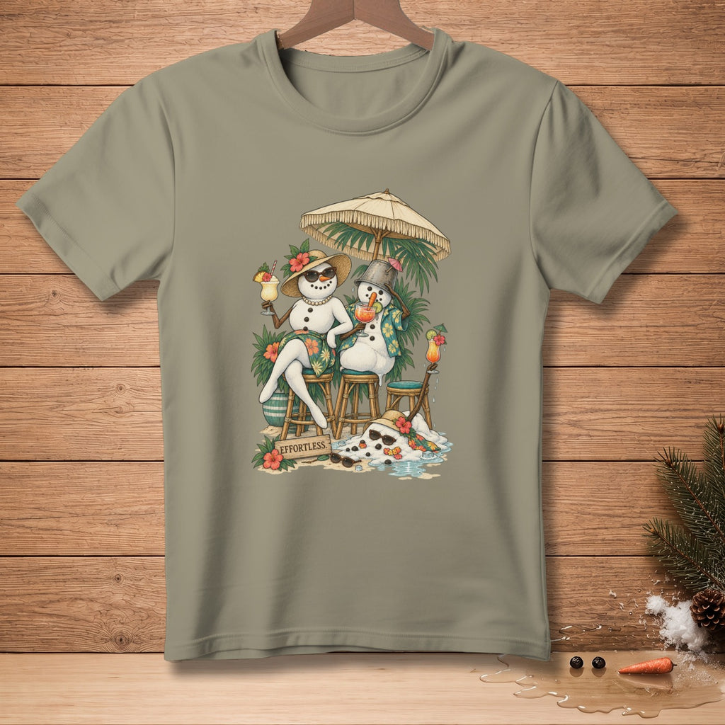 Two snowmen on a beach under an umbrella with drinks and text "EFFORTLESS".
