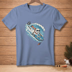 Snowman wearing sunglasses and scarf surfing a wave, text "SHRED IT."