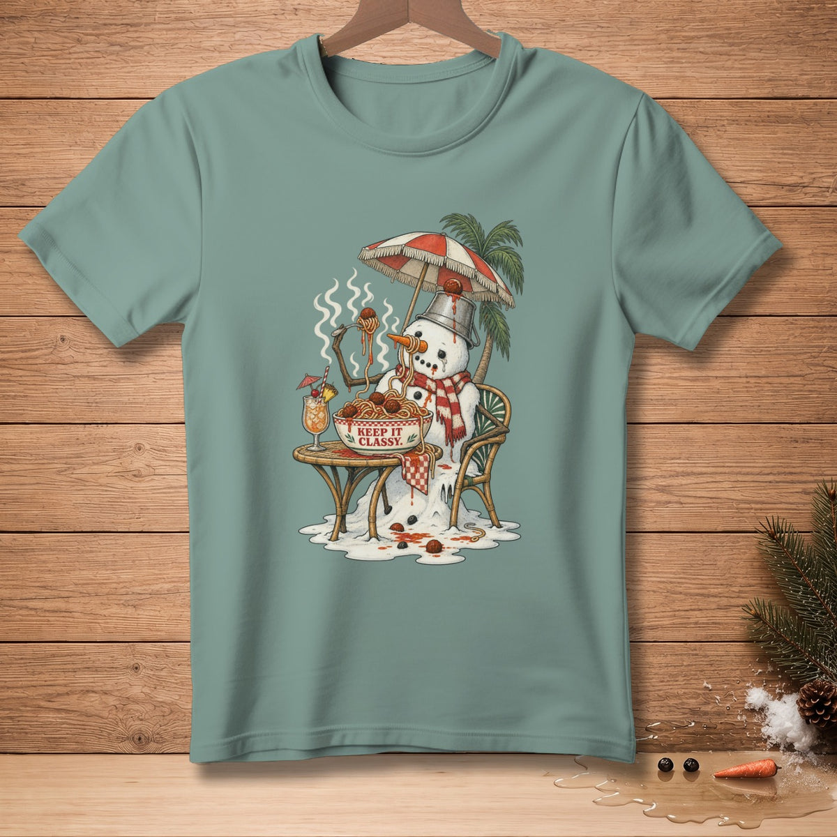 Snowman eating spaghetti under an umbrella with a drink and "Keep It Classy" text.