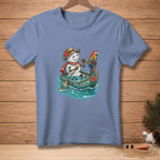 Snowman in a canoe with a parrot, text "STILL FLOATING".