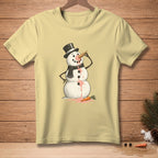 Yellow t-shirt with melting snowman wearing a hat and scarf eating ice cream.