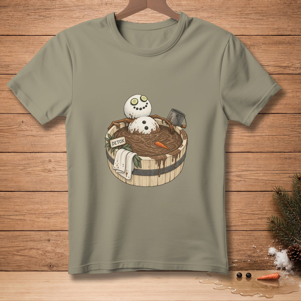 T-shirt graphic of a snowman in a detox mud bath with a carrot and cucumbers.