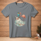 Flamingo offers melting snowman a tropical drink in a humorous illustration.