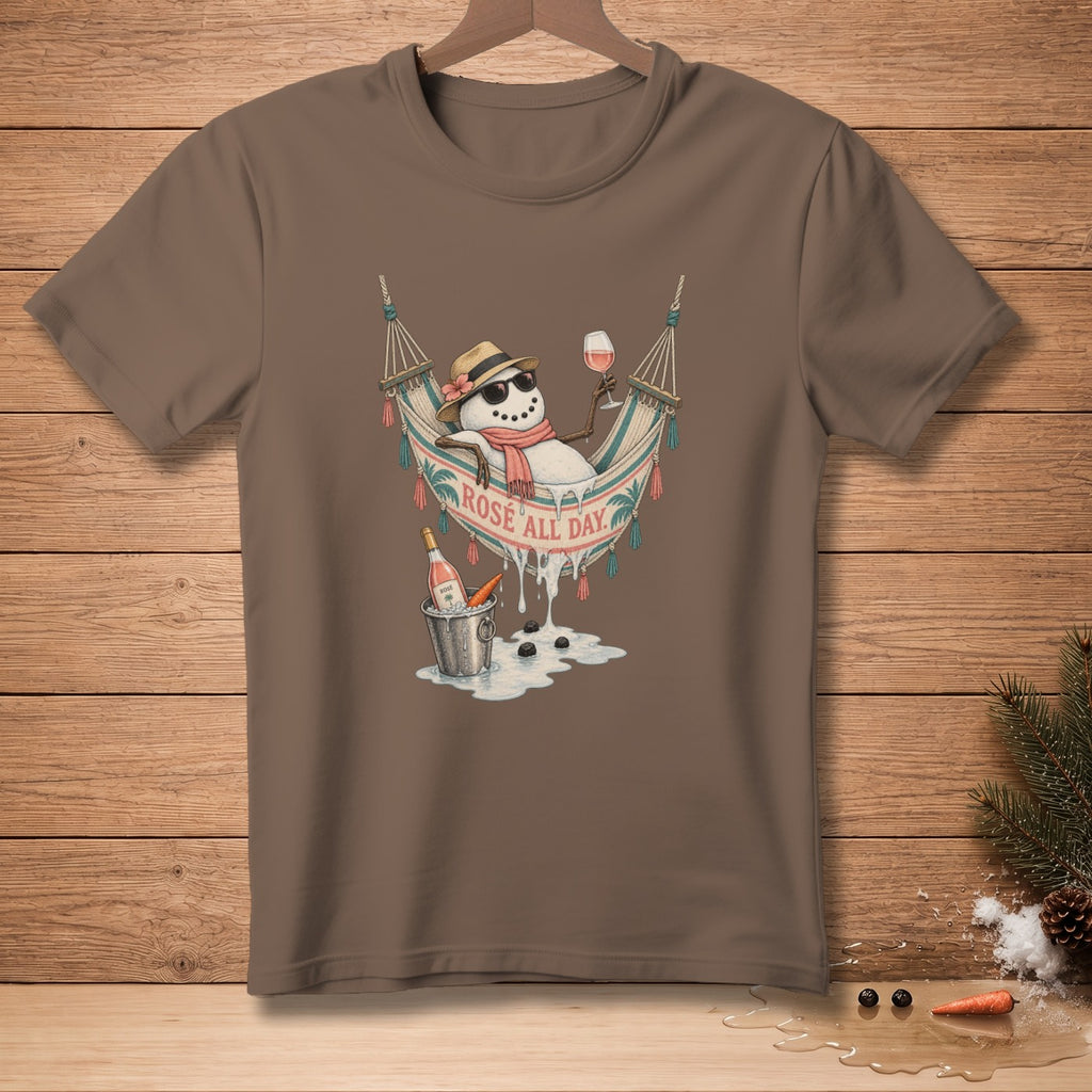 Snowman in hammock with wine and bucket, "ROSÉ ALL DAY" text on shirt.