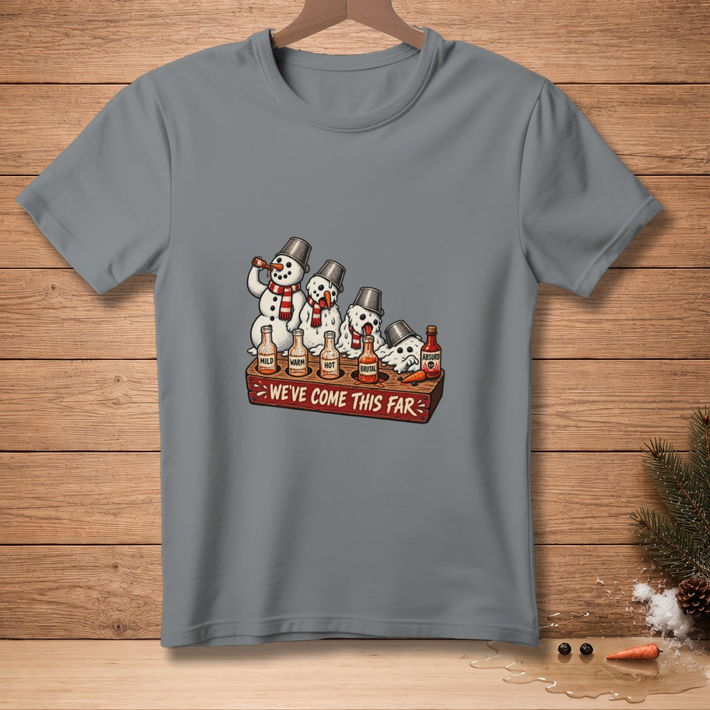 Snowmen tasting hot sauce bottles labeled Mild, Warm, Hot, Brutal, Absurd. We've come this far.