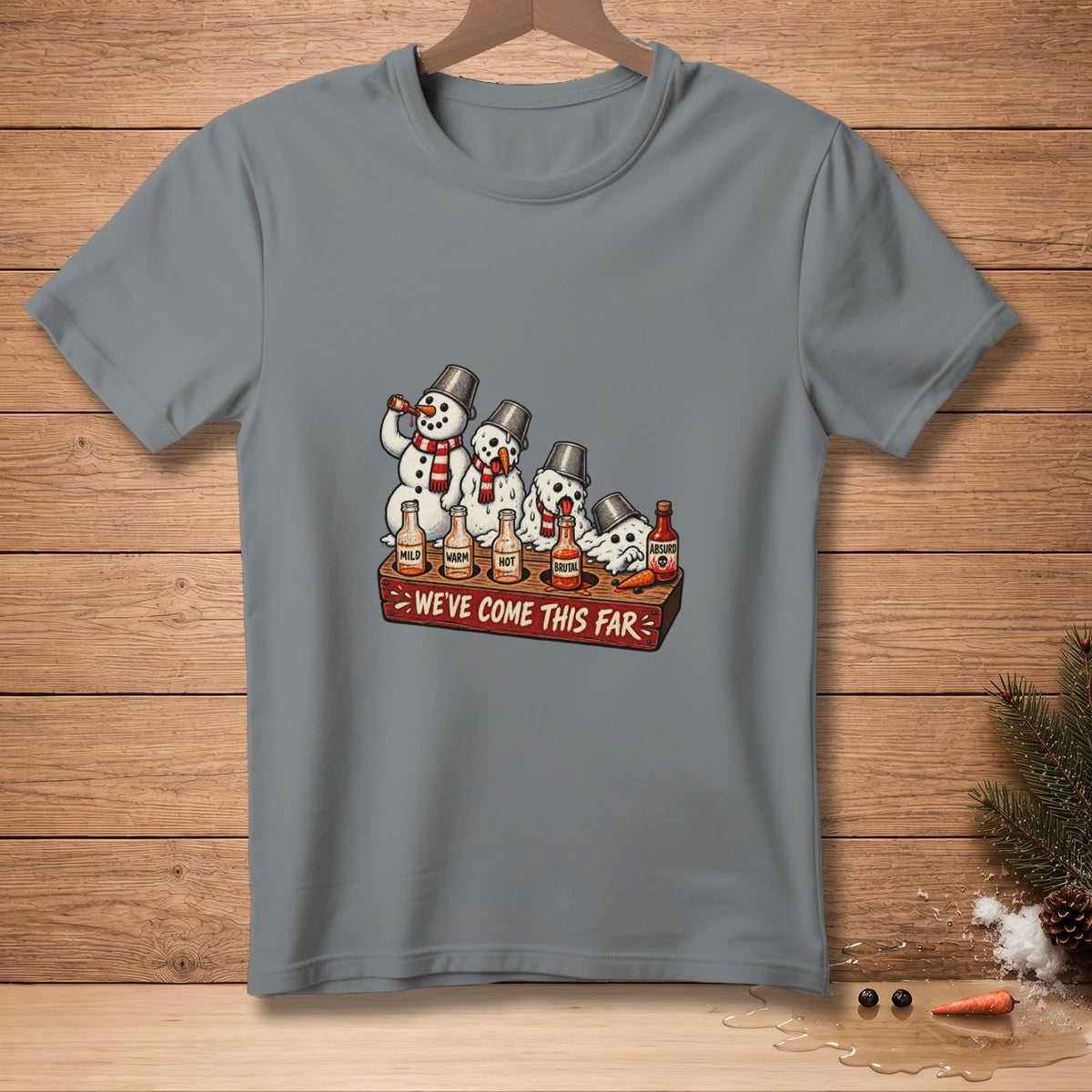 Snowmen tasting hot sauce bottles labeled Mild, Warm, Hot, Brutal, Absurd. We've come this far.
