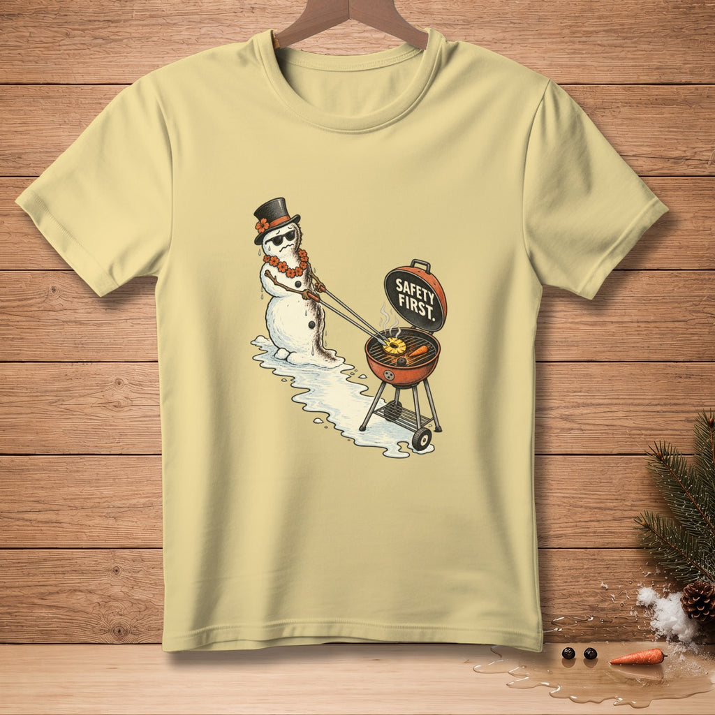 Snowman wearing sunglasses and a hat grills pineapple rings with text "Safety First."