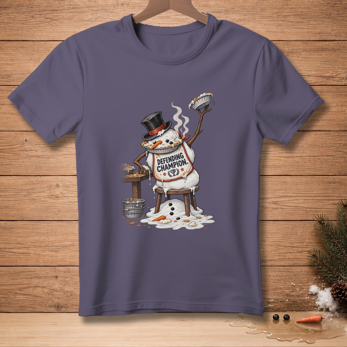 Snowman in a top hat with a pie, wearing a "Defending Champion" bib.
