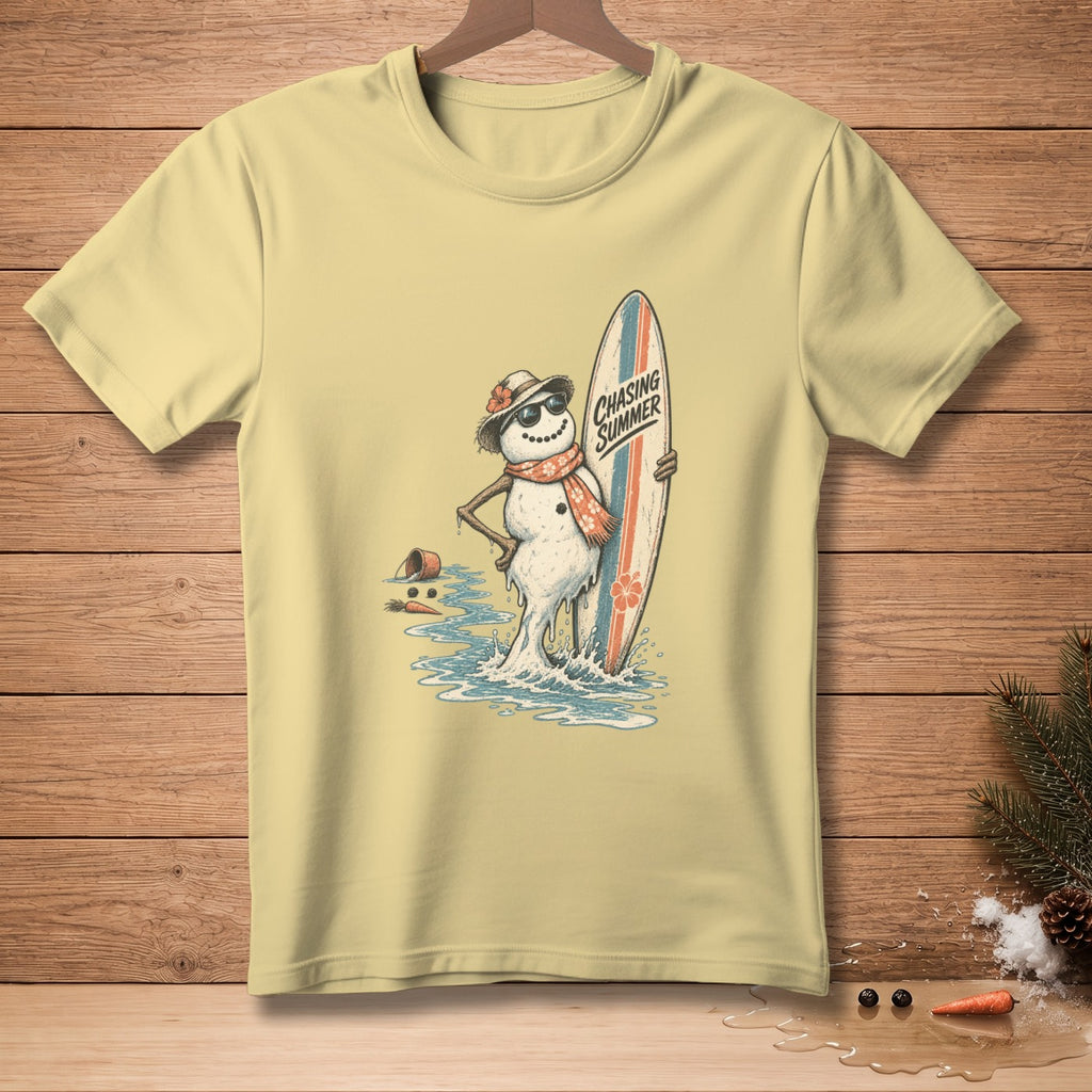T-shirt with a melting snowman holding a surfboard and wearing sunglasses.
