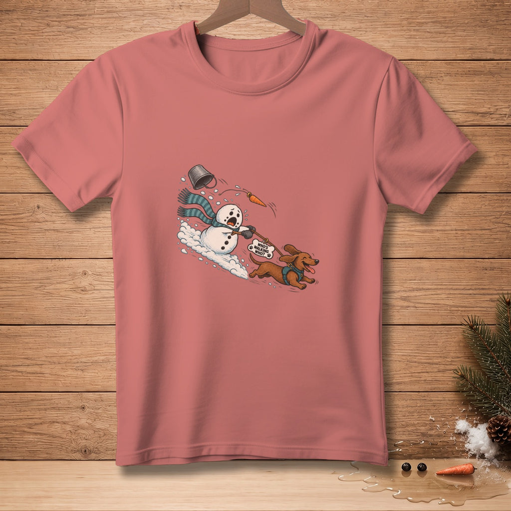 Snowman being walked by a dachshund wearing a "Who's walking who?" sign.