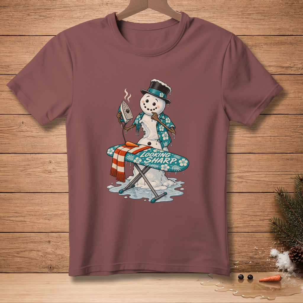 Snowman ironing a scarf on an ironing board with "Looking Sharp" text.
