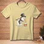 Melting snowman in a top hat about to blow out a cupcake candle that says "Make a Wish".