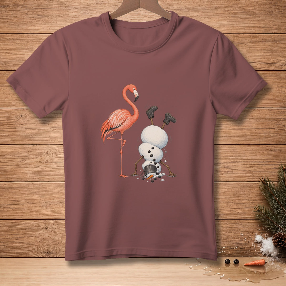 Flamingo standing next to a snowman doing a handstand with boots on.