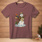 Snowman explorer with parrot and map pointing, on maroon t-shirt.