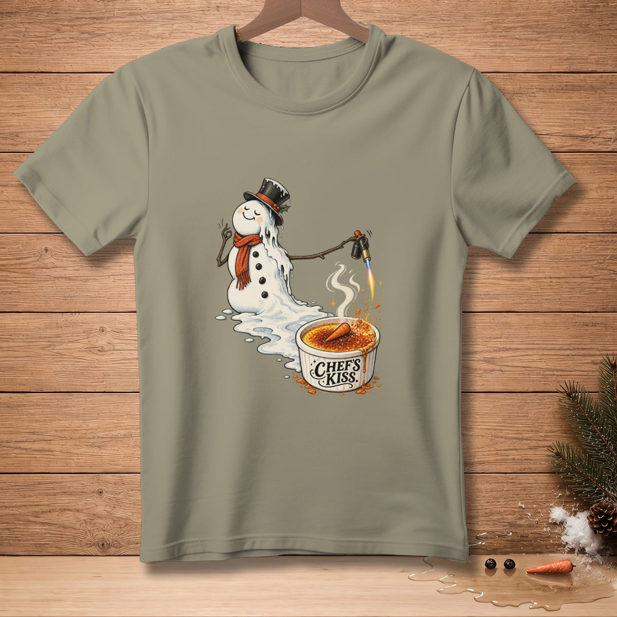 Melting snowman using a torch on a crème brûlée with "Chef's Kiss" text.
