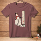 Two snowmen stand next to a height chart that reads "PERSONAL BEST" at 12 inches.