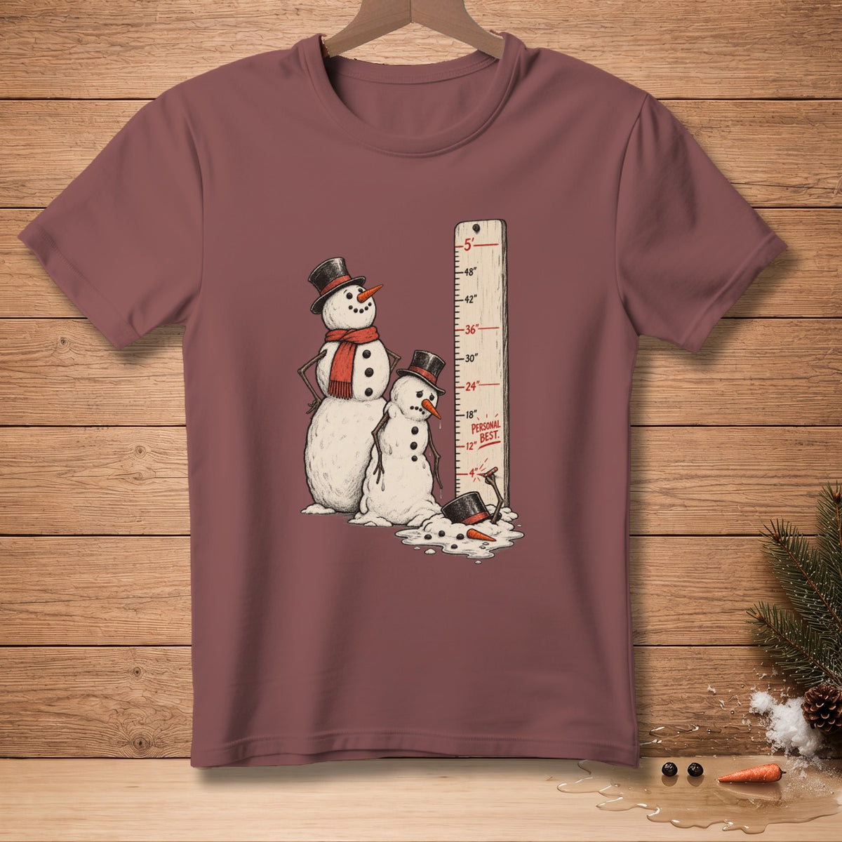 Two snowmen stand next to a height chart that reads "PERSONAL BEST" at 12 inches.