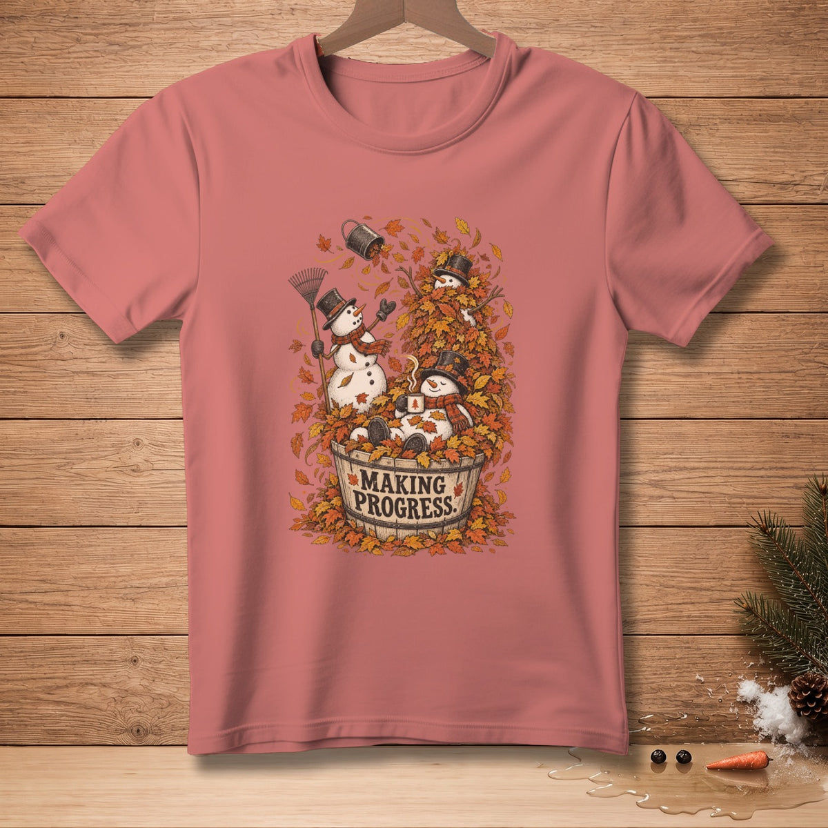 Snowmen in leaves with text "MAKING PROGRESS" on bucket.