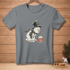 Melting snowman wearing a top hat and scarf, blowing out a cupcake candle.