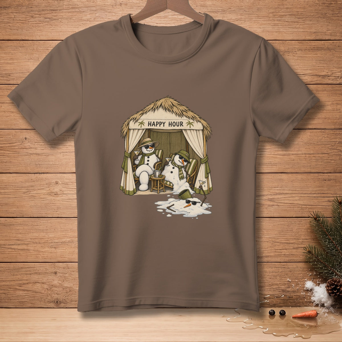 T-shirt graphic with snowmen relaxing under a thatched roof hut labeled "Happy Hour."
