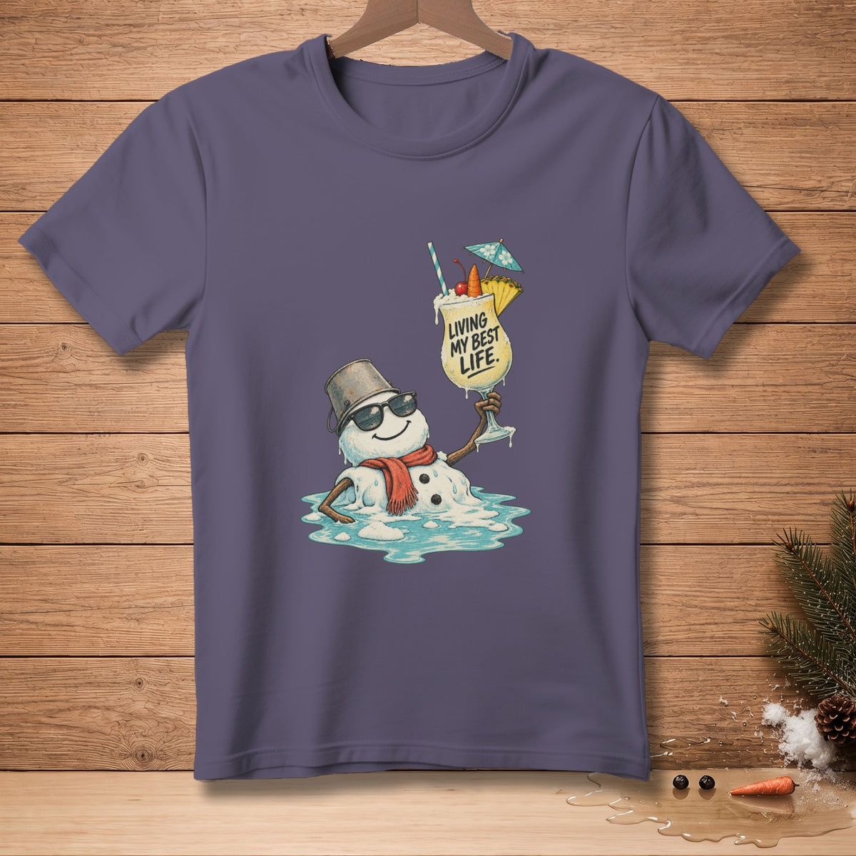 Melting snowman wearing sunglasses and scarf, holding a cocktail, with text "LIVING MY BEST LIFE."
