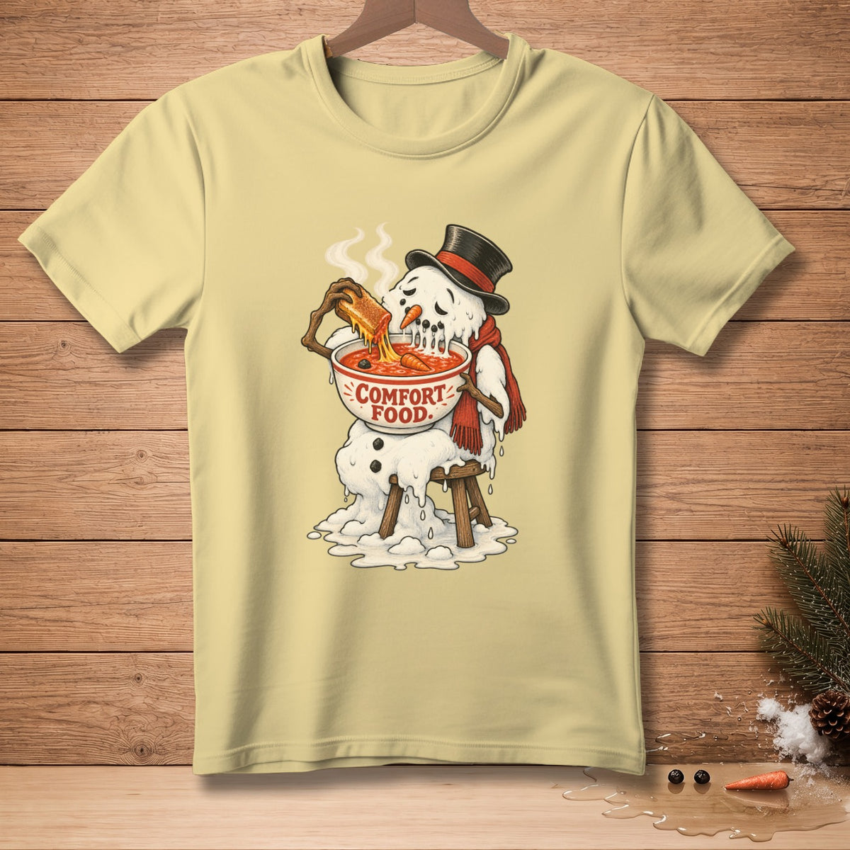 Melting snowman in top hat and scarf eats spaghetti from a bowl labeled "COMFORT FOOD."