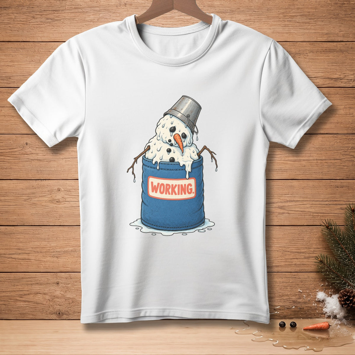 White t-shirt with melting snowman in a bucket labeled "Working".