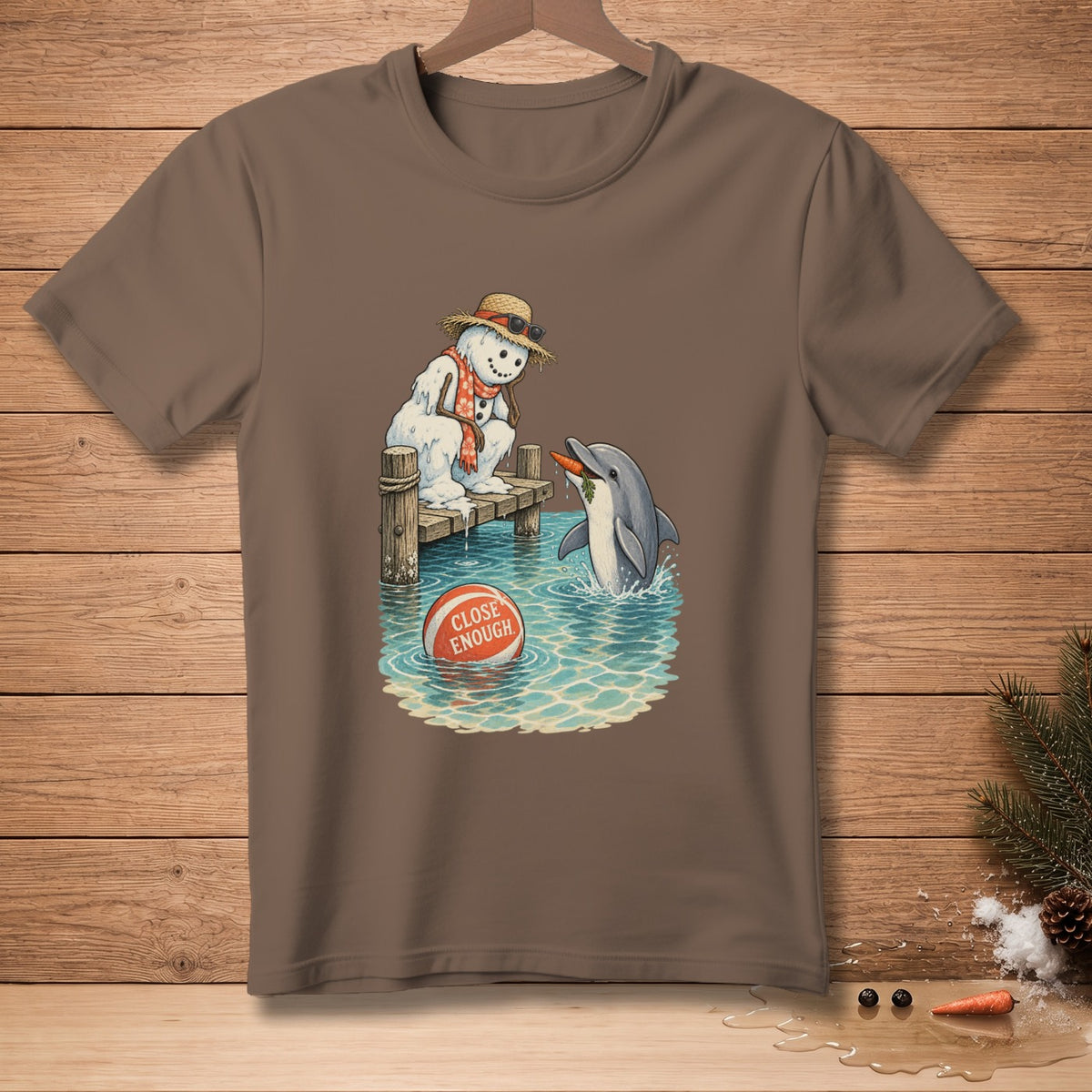 Snowman on dock with sunglasses and scarf gives carrot to dolphin.