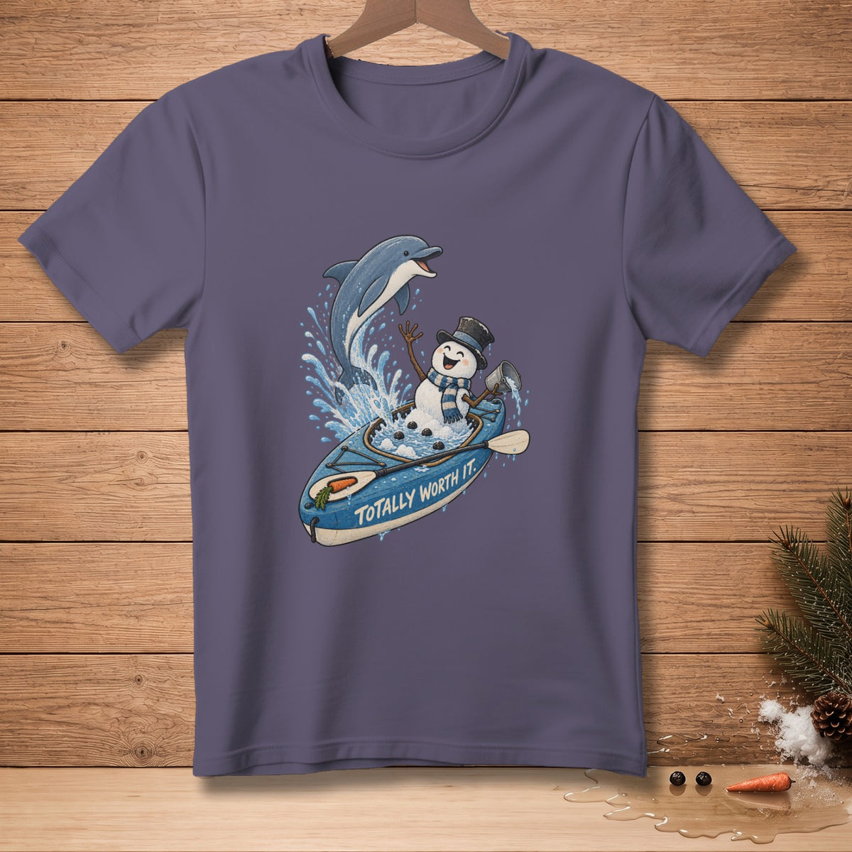Snowman in kayak with dolphin, text reads "Totally Worth It".