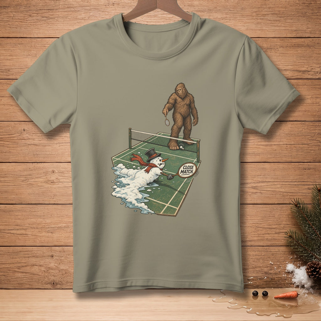Bigfoot plays badminton against a melting snowman on a court, reading "Close Match."