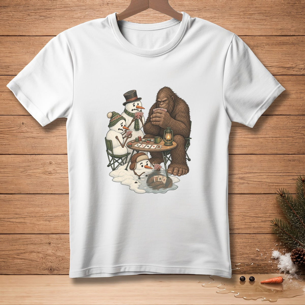 Bigfoot and snowmen play poker by lamplight on a white t-shirt.