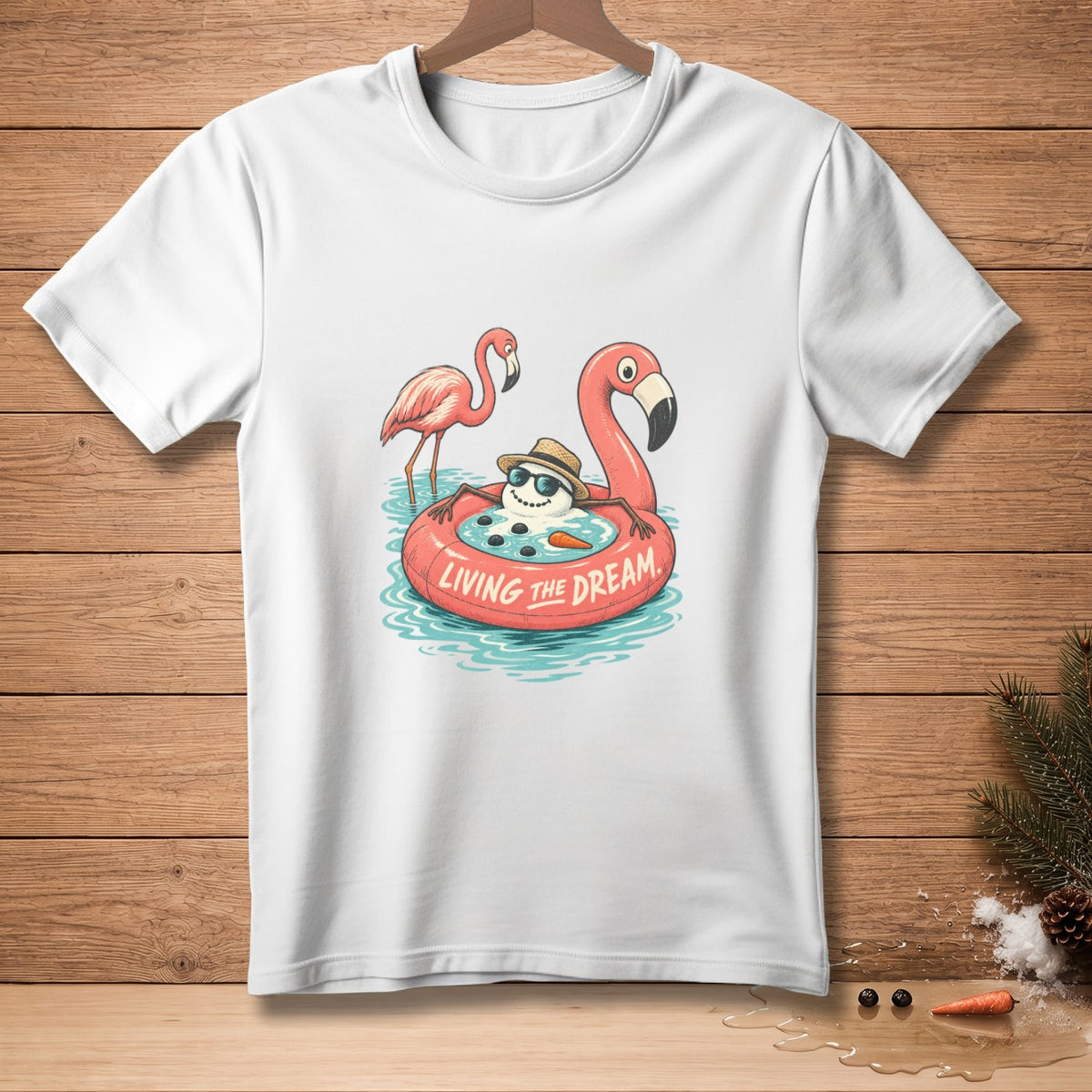 Snowman in flamingo float with two flamingos, text "LIVING THE DREAM"